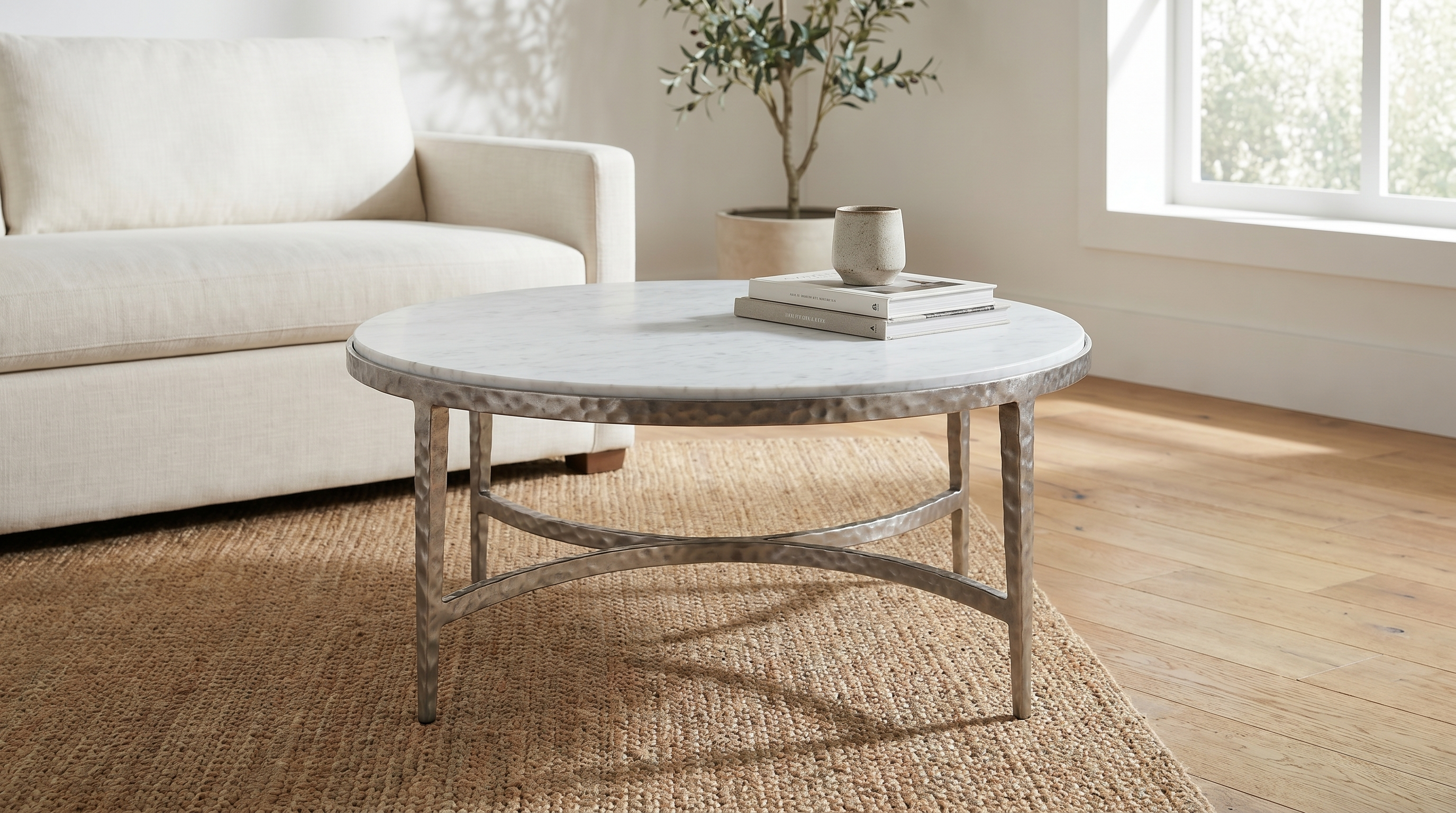 Cortez Round Forged Marble Coffee Table — Raw Stainless