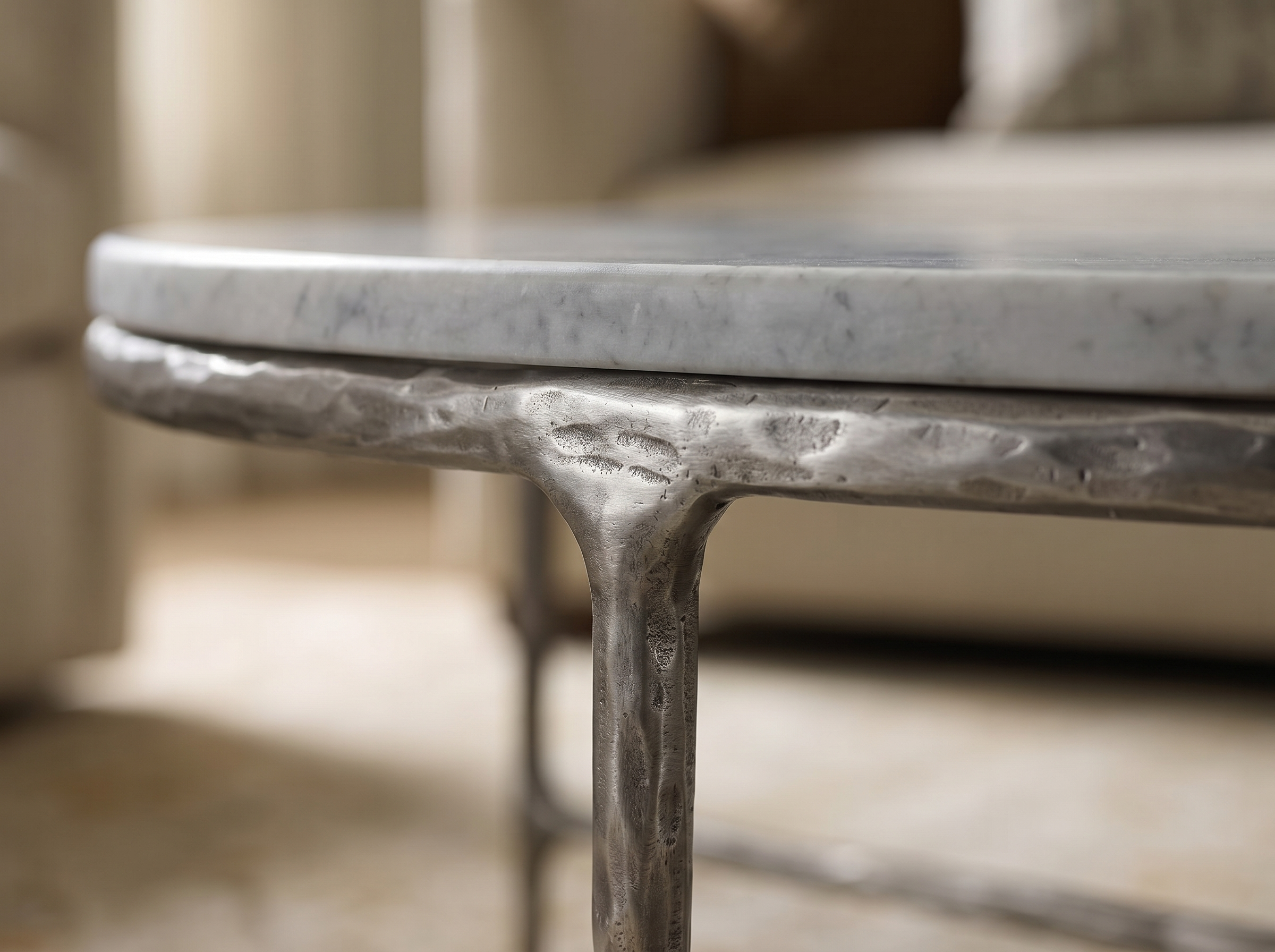 Cortez Round Forged Marble Coffee Table in Raw Stainless — Detail